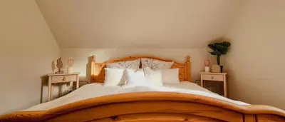 Ein Bett oder Betten in einem Zimmer der Unterkunft Villa Wundervoll
