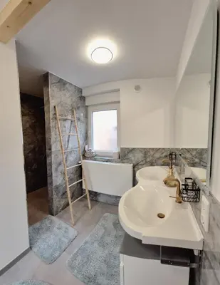 Ein Badezimmer in der Unterkunft Villa Wundervoll