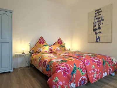 Ein Bett oder Betten in einem Zimmer der Unterkunft Vintage-Wohnung Silberstadt