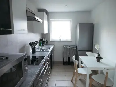 Küche/Küchenzeile in der Unterkunft Gemeinschaftsapartment 8 - Ferienwohnung Ottendorf-Okrilla