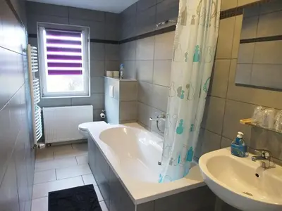 Ein Badezimmer in der Unterkunft Gemeinschaftsapartment 8 - Ferienwohnung Ottendorf-Okrilla
