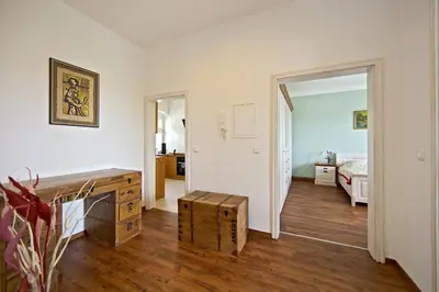 Ein Bett oder Betten in einem Zimmer der Unterkunft Ferienwohnung am Blauen Wunder