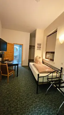Ein Bett oder Betten in einem Zimmer der Unterkunft Burgblick