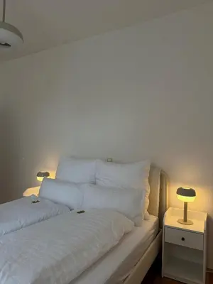Ein Bett oder Betten in einem Zimmer der Unterkunft Charmanter Altbau