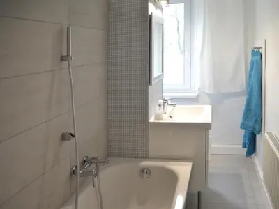 Ein Badezimmer in der Unterkunft F2 - Am alten Elbarm - Laubegast