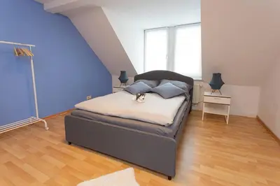 Ein Bett oder Betten in einem Zimmer der Unterkunft Pretty Home Skyline Work & Stay