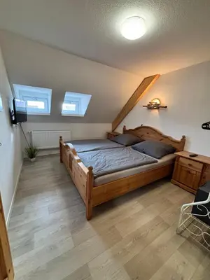 Ein Bett oder Betten in einem Zimmer der Unterkunft Ferienwohnung Elbbrise