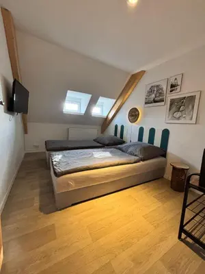 Ein Bett oder Betten in einem Zimmer der Unterkunft Ferienwohnung Elbbrise