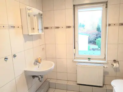 Ein Badezimmer in der Unterkunft Seyfarthrooms - Monteurwohnung Großröhrsdorf 1 - zentrale Lage, gute Anbindung, voll ausgestattet