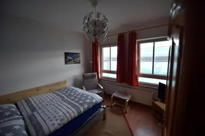 Ein Bett oder Betten in einem Zimmer der Unterkunft Ferienwohnung Dresden Elbe