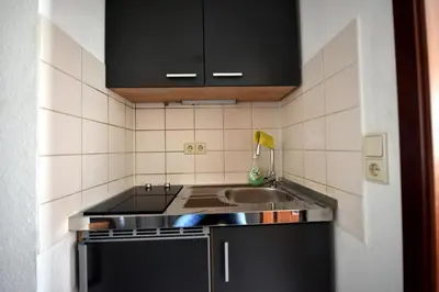Küche/Küchenzeile in der Unterkunft Ferienwohnung Dresden Laubegast