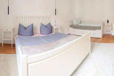 Ein Bett oder Betten in einem Zimmer der Unterkunft Ruhige Wohnung auf dem Sonnenstein