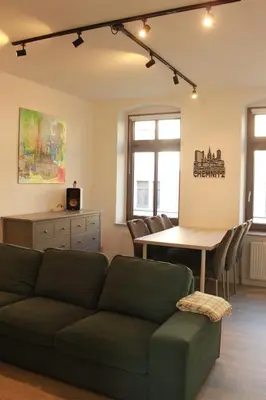 Ein Sitzbereich in der Unterkunft 3 Raum Businessapartment in der Kulturhauptstadt 2025 #Kaffeevollautomat #65 Zoll TV mit Surround Soundanlage
