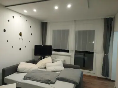 Ein Bett oder Betten in einem Zimmer der Unterkunft Wohnen im Grünen, 2 min zur Autobahn