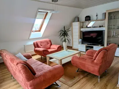 Ein Sitzbereich in der Unterkunft Schöne 2-Raumwohnung inklusive Infrarot-Wärmekabine