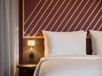 Ein Bett oder Betten in einem Zimmer der Unterkunft B&B HOTEL Dresden City-Süd