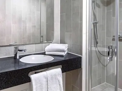 Ein Badezimmer in der Unterkunft B&B HOTEL Dresden City-Süd