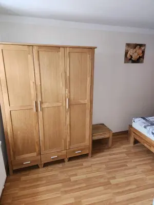 Ein Bett oder Betten in einem Zimmer der Unterkunft Ferienwohnung Rosso Vino 1