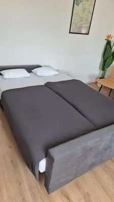 Ein Bett oder Betten in einem Zimmer der Unterkunft Apartment Sol Chemnitz - Keyless Access, Parking, Home Office