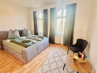 Ein Sitzbereich in der Unterkunft Komfortable Ferienwohnung im Stadtzentrum und Seenähe