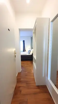 Ein Bett oder Betten in einem Zimmer der Unterkunft Good Stay Aparthotel mit kostenlosen Parkplätzen