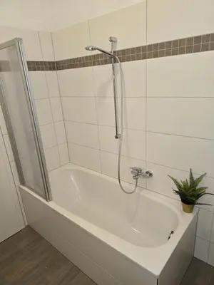 Ein Badezimmer in der Unterkunft WohnTraum zur alten Post, Sauna, Altstadt