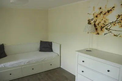 Ein Bett oder Betten in einem Zimmer der Unterkunft Ferienwohnung an der Elbe