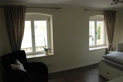 Ein Bett oder Betten in einem Zimmer der Unterkunft Ferienwohnung an der Elbe