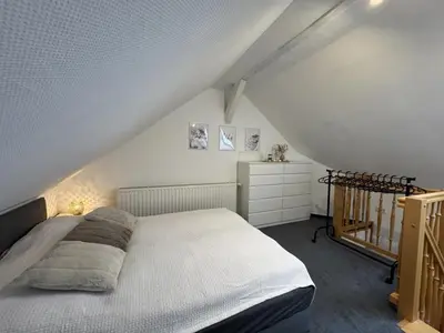 Ein Bett oder Betten in einem Zimmer der Unterkunft NEU! Ferienhaus Sanja