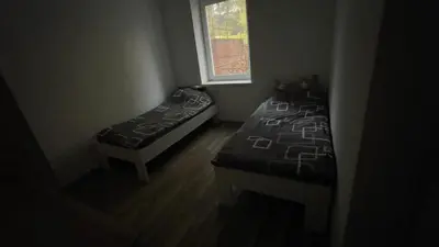 Ein Bett oder Betten in einem Zimmer der Unterkunft Buildingz Apartments Freiberg