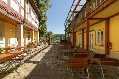 Ein Balkon oder eine Terrasse in der Unterkunft Pension HOFZWANZIG Dresden-Laubegast