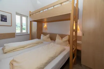 Ein Bett oder Betten in einem Zimmer der Unterkunft Pension HOFZWANZIG Dresden-Laubegast