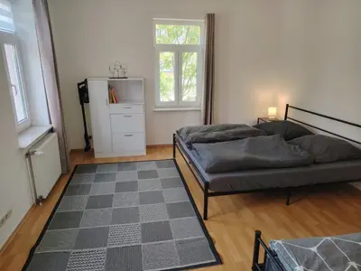 Ein Bett oder Betten in einem Zimmer der Unterkunft Ruhige Auszeit mit zentraler Anbindung