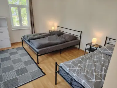 Ein Bett oder Betten in einem Zimmer der Unterkunft Ruhige Auszeit mit zentraler Anbindung
