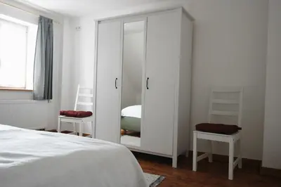 Ein Bett oder Betten in einem Zimmer der Unterkunft Fewo Arnsdorf