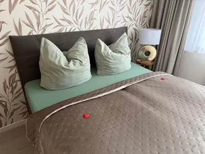 Ein Bett oder Betten in einem Zimmer der Unterkunft Villa Hentschel