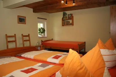 Ein Bett oder Betten in einem Zimmer der Unterkunft Ferienwohnungen Dobrahof