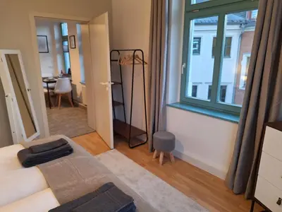 Ein Bett oder Betten in einem Zimmer der Unterkunft Schick übernachten im historischen Viertel