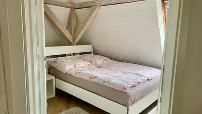 Ein Bett oder Betten in einem Zimmer der Unterkunft Dresden City - über den Dächern der Stadt