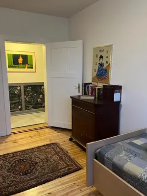Ein Bett oder Betten in einem Zimmer der Unterkunft Rim Ferienwohnung in Lauchhammer 1 OG 100 qm
