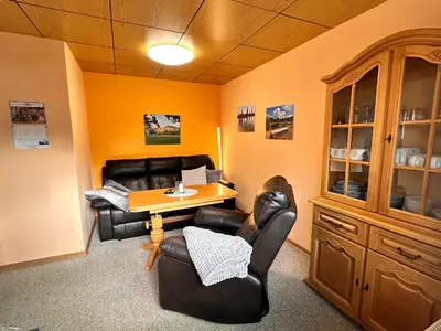 Ein Sitzbereich in der Unterkunft Ferienhaus Hentzschel
