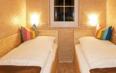 Ein Bett oder Betten in einem Zimmer der Unterkunft Feriensiedlung am Bierwiesenteich
