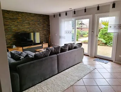Ein Sitzbereich in der Unterkunft Ferienhaus Schwanensee