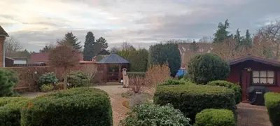 Ein Garten an der Unterkunft Ferienhaus Schwanensee