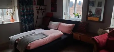 Ein Bett oder Betten in einem Zimmer der Unterkunft Ferienwohnung 60 qm
