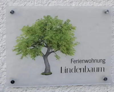 Ein Zertifikat, Auszeichnung, Logo oder anderes Dokument, das in der Unterkunft Ferienwohnung Lindenbaum ausgestellt ist