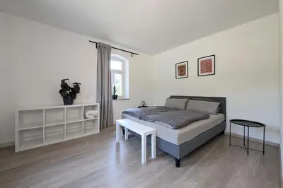 Ein Bett oder Betten in einem Zimmer der Unterkunft Ferienwohnung Lauber
