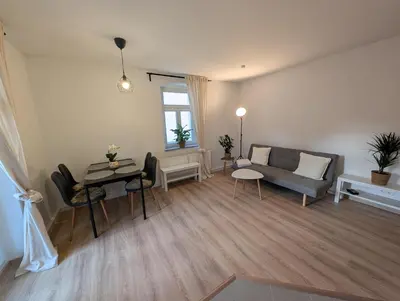Ein Sitzbereich in der Unterkunft Ferienwohnung Lauber