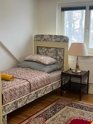 Ein Bett oder Betten in einem Zimmer der Unterkunft Rim Ferienwohnung in Lauchhammer Dachgeschoss 100 qm