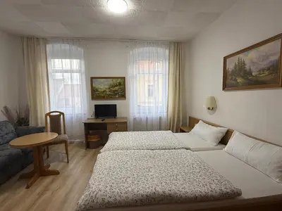 Ein Bett oder Betten in einem Zimmer der Unterkunft Landgasthof zur guten Quelle